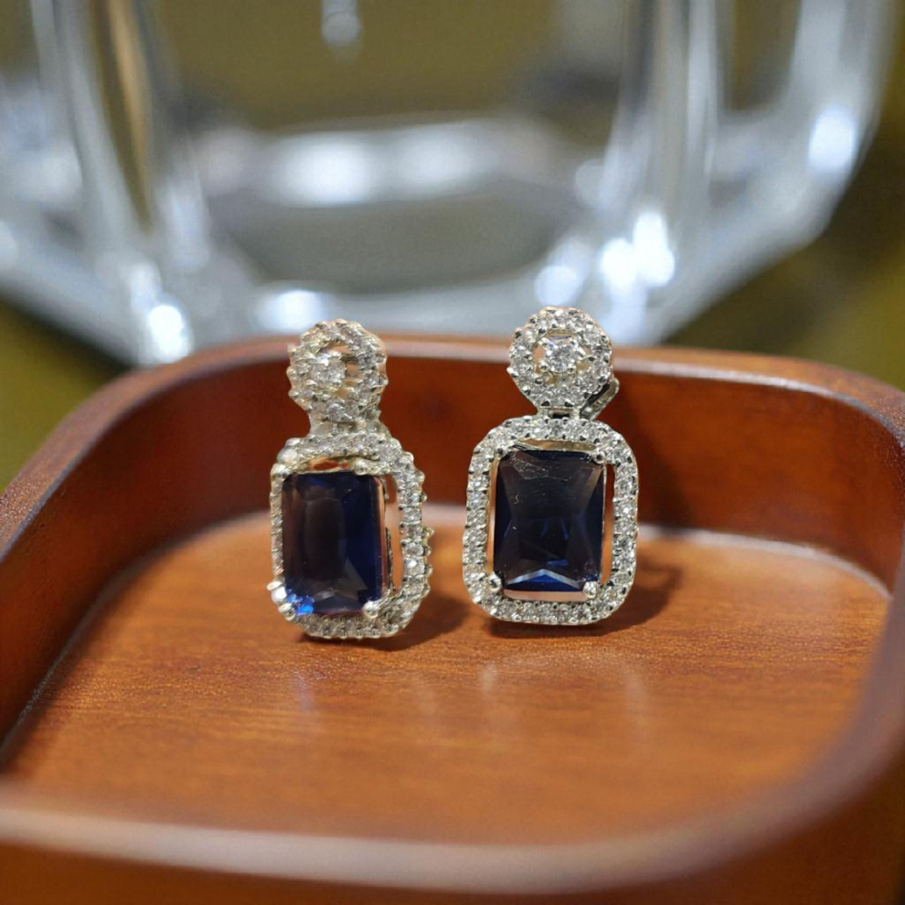 Pair of earrings with blue gemstones and diamond-like stones