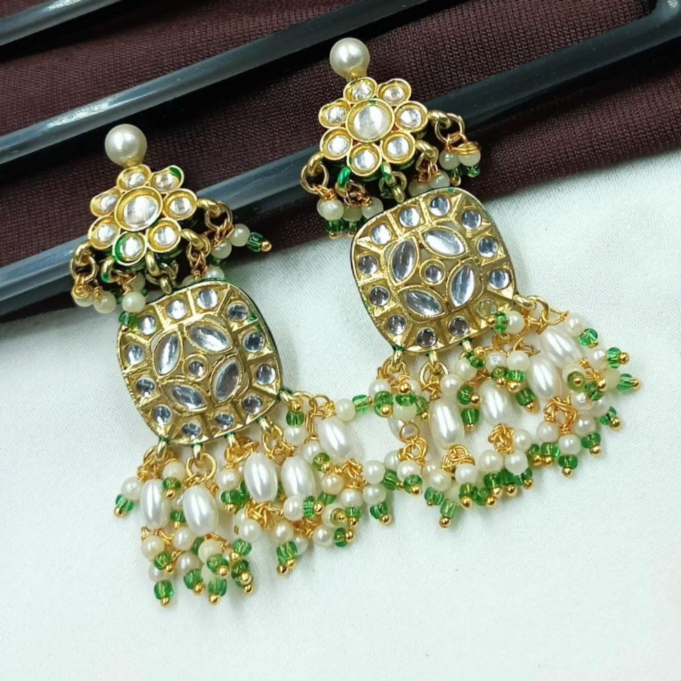 Gold-tone earrings with floral studs, mirror work, and pearl-green bead tassels in a traditional Indian design.