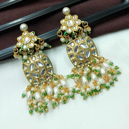 Gold-tone earrings with floral studs, mirror work, and pearl-green bead tassels in a traditional Indian design.